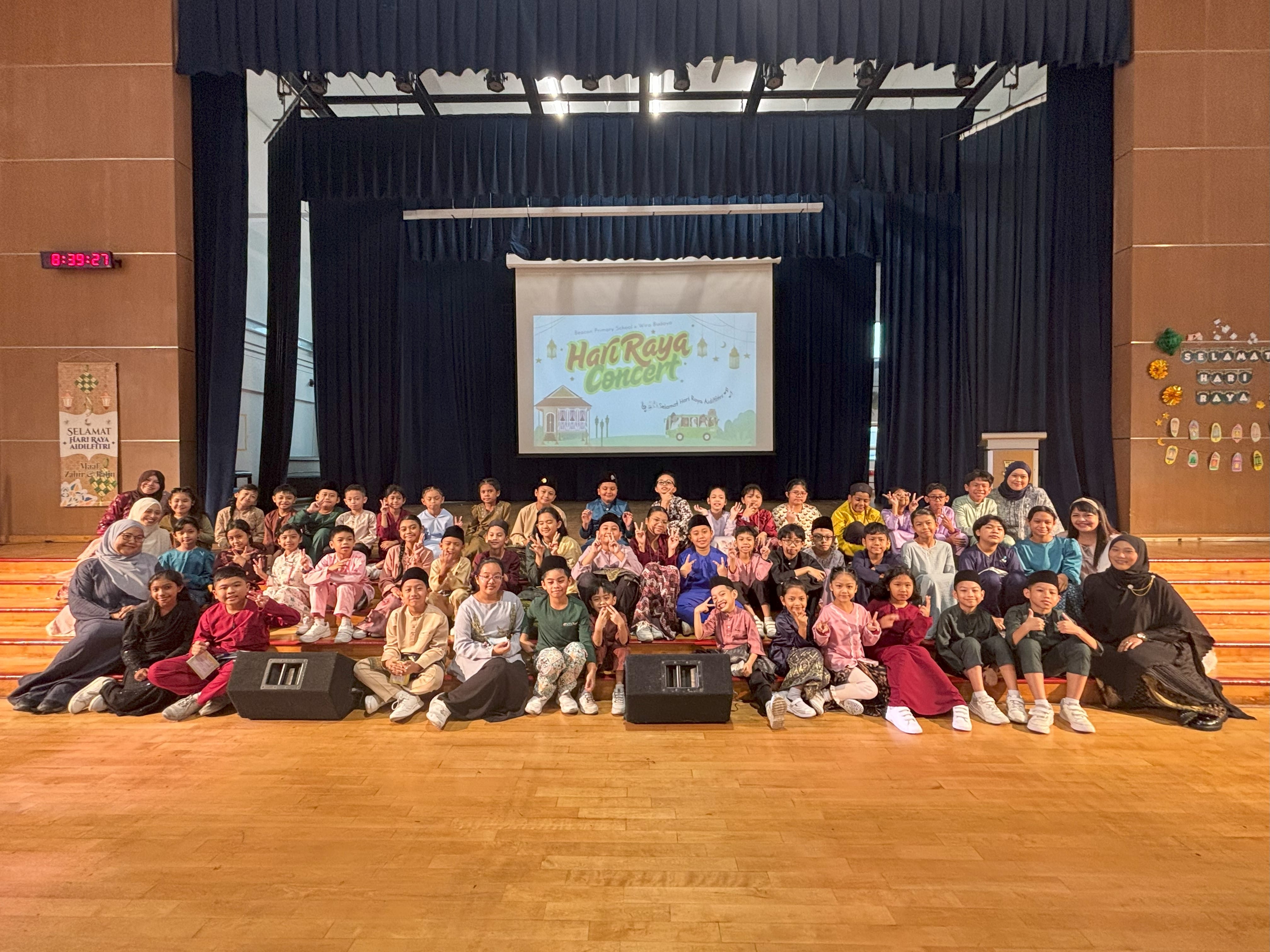 Mass photo of all student performers and teachers involved in Hari Raya Concert 2026